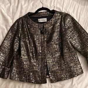 Beautiful gold and black blouse . Need gone asap!!